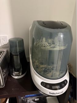 Baby bottle washer and warmer