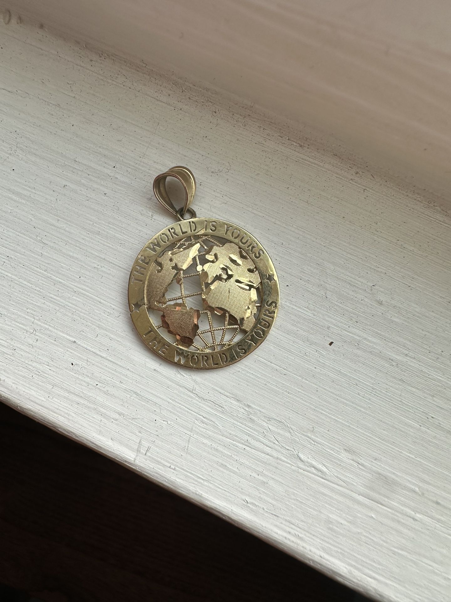 The World Is Yours 10k Yellow Gold Pendant 