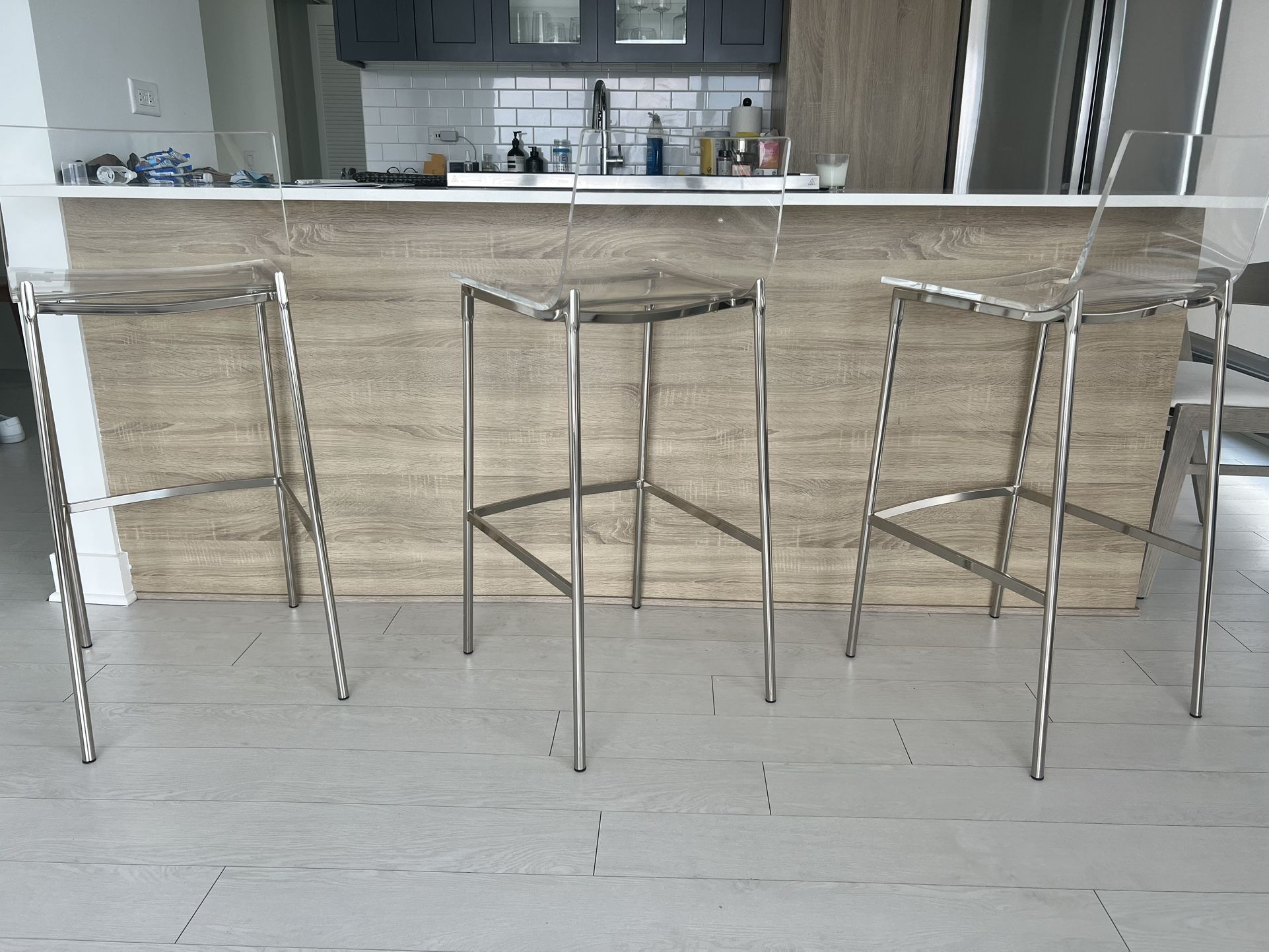 CB2 Chiaro Clear Counter Stools in Nickel Set Of 3
