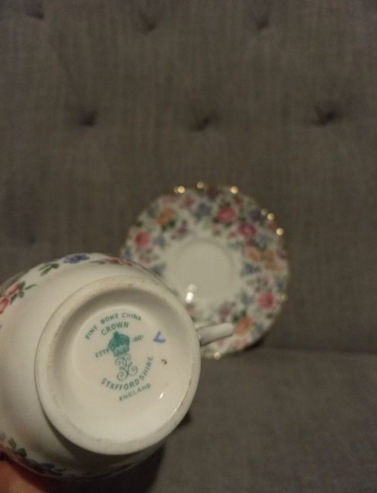 Antique Crown Staffordshire teacup and saucer with small blossoms