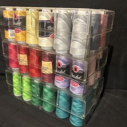 Multiple brands Of Interlocking And Polyester Thread.