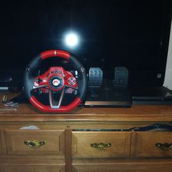 Red And Black Nintendo Seitch Steering Wheel And Gas Pedals