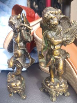 Pair of bronze angles figures