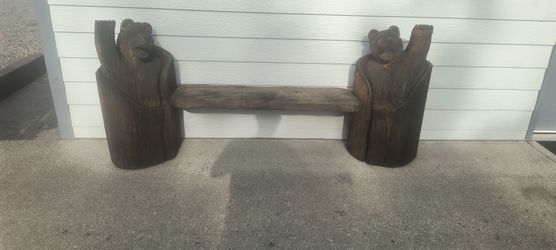 Carved bear bench