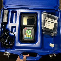 Olympus 38DL PLUS ultrasonic thickness gauge.