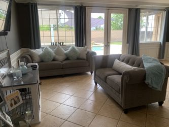 2 piece sofa set in gray Lightly used In excellent condition.