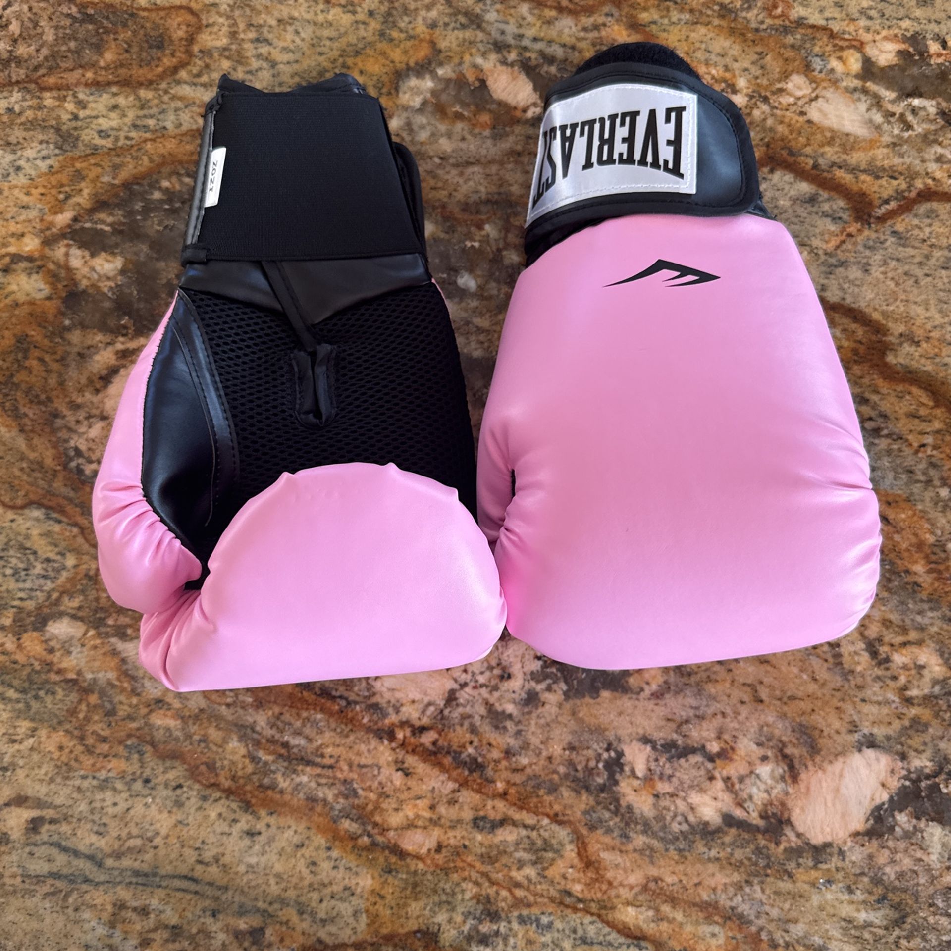 Pink 12 ounce boxing gloves