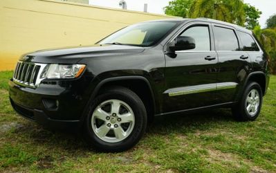 Jeep Grand Cherokee Laredo 2011! With only $1500 down payment I can get you approved... Bad credit.. no credit. repo? No problem...
