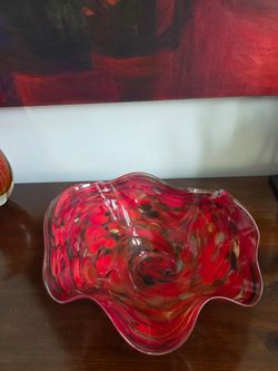 Hand-blown art glass ruffled bowl in red with orange and yellow swirls signed by James Hayes