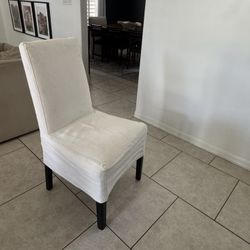 Set of 4 Ikea bergmund dining chairs with slip cover