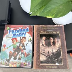 two DVD cases side-by-side. The text on the cases indicates they are for the films Flushed Away 