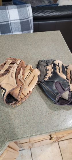2 baseball gloves 11.25 and 11