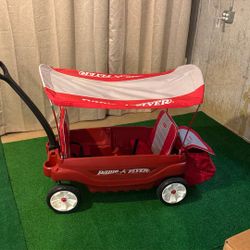 Radio Flyer foldable wagon with canopy and seats
