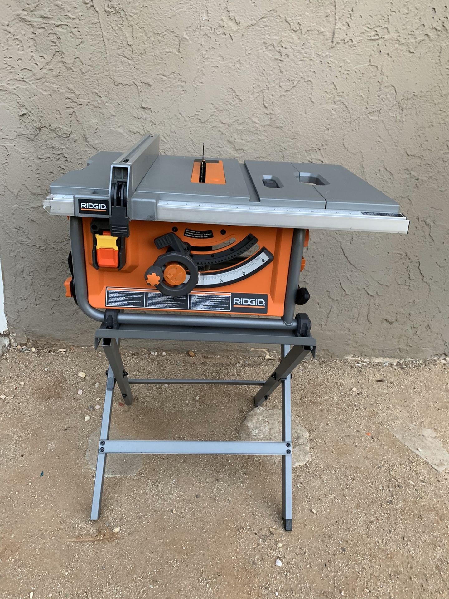 RIDGID 15 Amp Corded 10 in. Compact Table Saw with Carbide Tipped Blade and Folding X-Stand