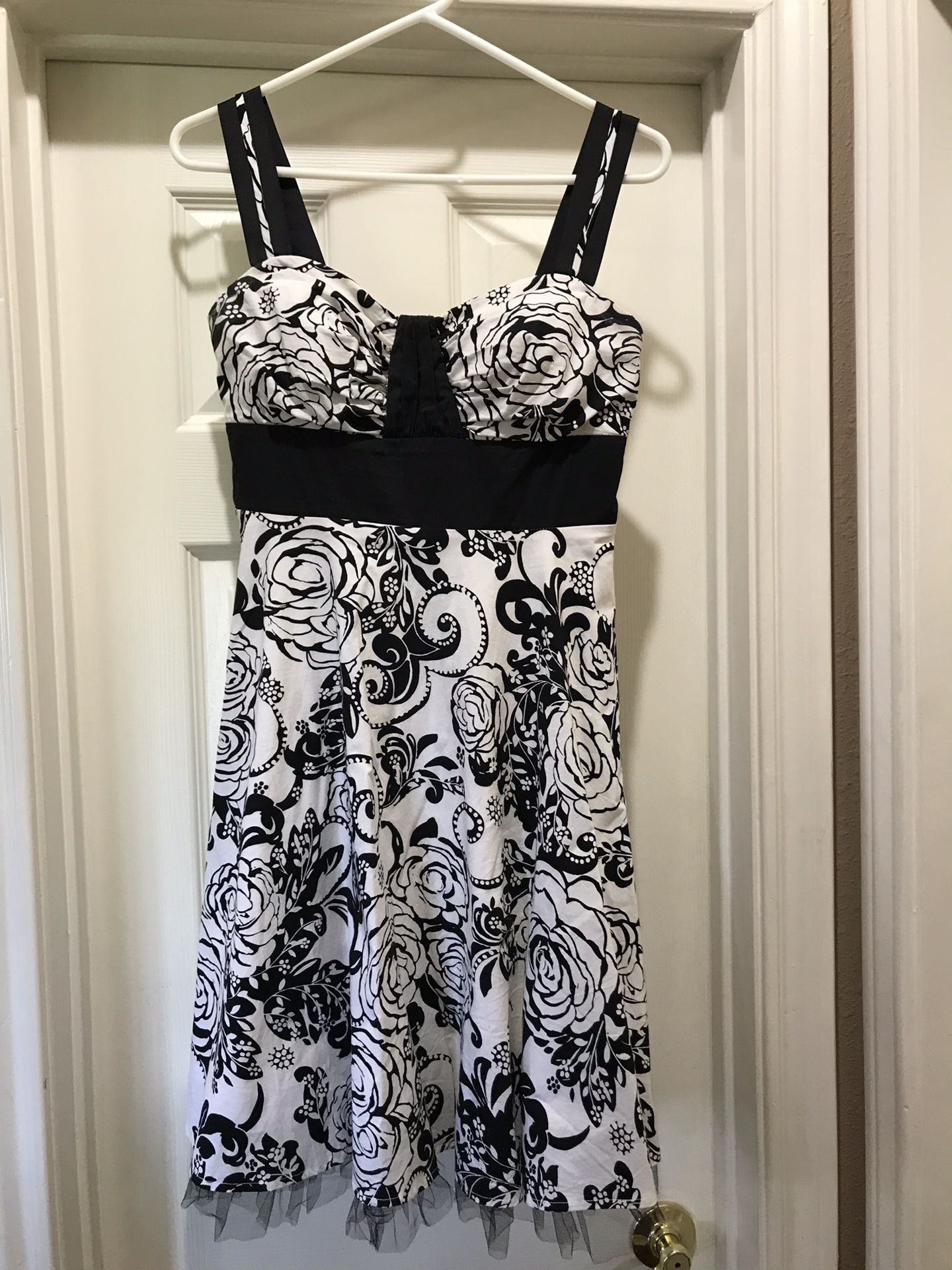 Black and white strapless dress with adjustable straps