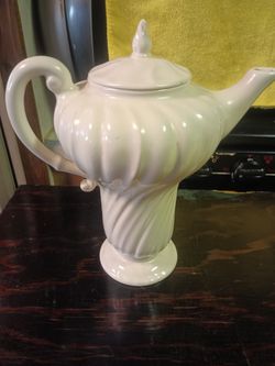 1930's vintage Francisco ware teapot in the Coronado swirl pattern for sale .