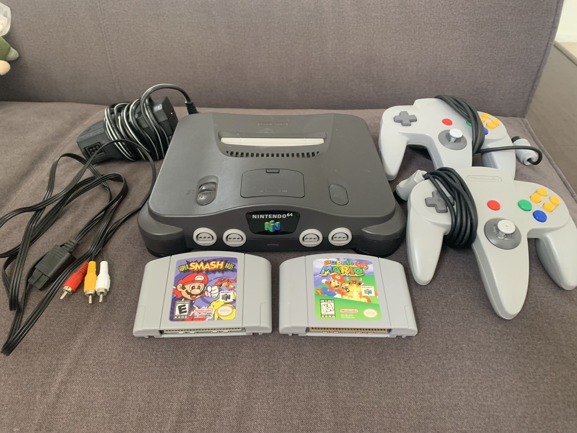 Nintendo 64 (W/ Cords) + Super Mario 64 + Super Smash Bros. + 2 Controllers