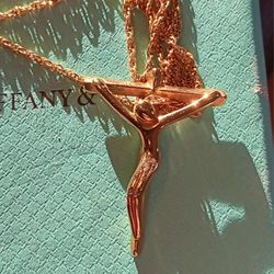 Stamped 750 (18kt) Tiffany Gold Crucifix  Elsa Paretti