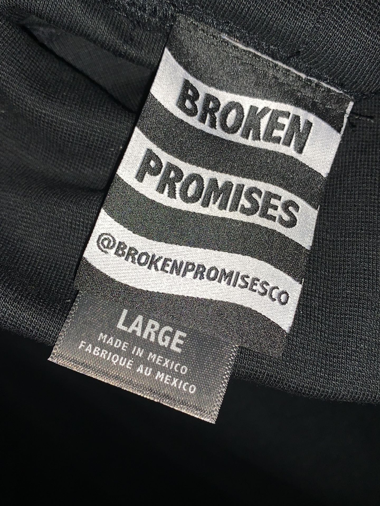 Broken Promises Black Turtleneck