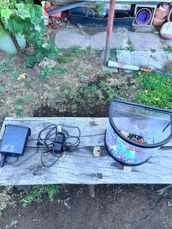 Fish tank with 2 filters. Get rid of fast. Shoot me a price.