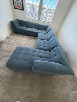 Teal Tufted Fabric Sectional Sofa from living spaces