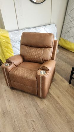 Manual rocker recliner