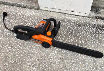 This is a Worx WG311 8 Amp 10" Electric Pole Saw, featuring a distinct orange and black housing.