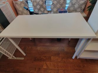 4 ft x 2 ft Ikea desk table in very good shape,  sturdy