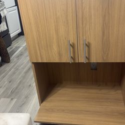 Wood storage cabinet