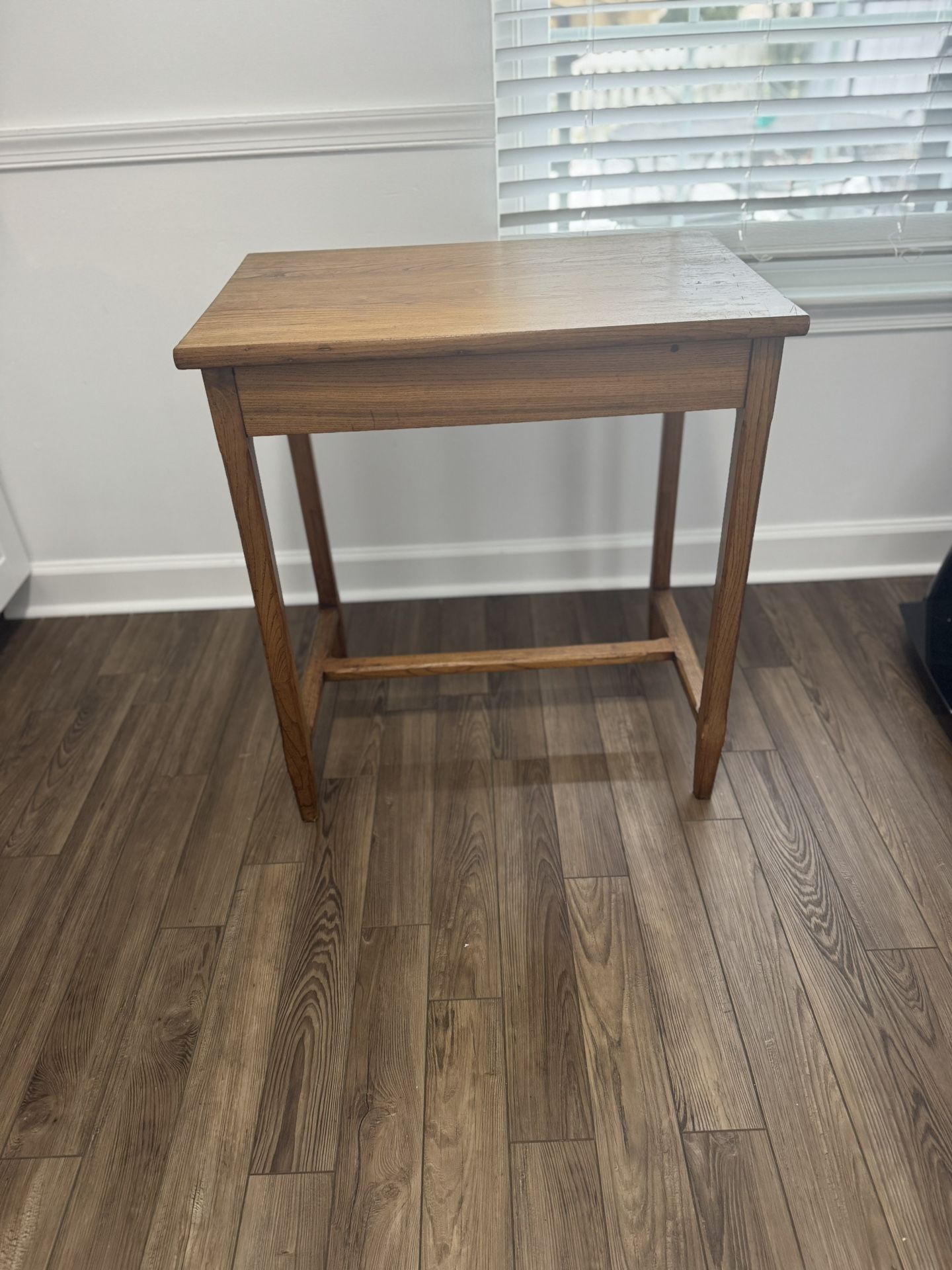Wooden TV stand or hallway table.