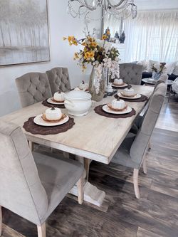 Whitewashed wood dining table
