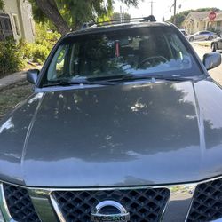 vendo hermosa Nissan Pathfinder  en excelente condición tituló Linpio 