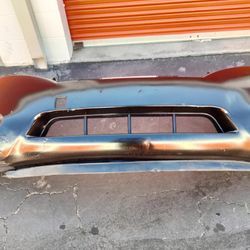 2011-2017 Nissan Quest Front Bumper With Fog Lights OEM.