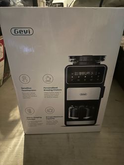 Coffee maker with grinder