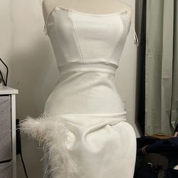 White gown with fur slit