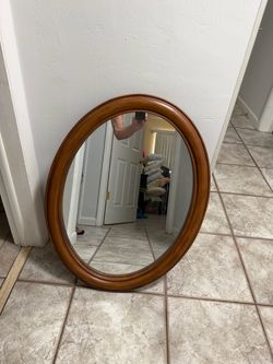 Wood Framed Oval Mirror 25” X 32”