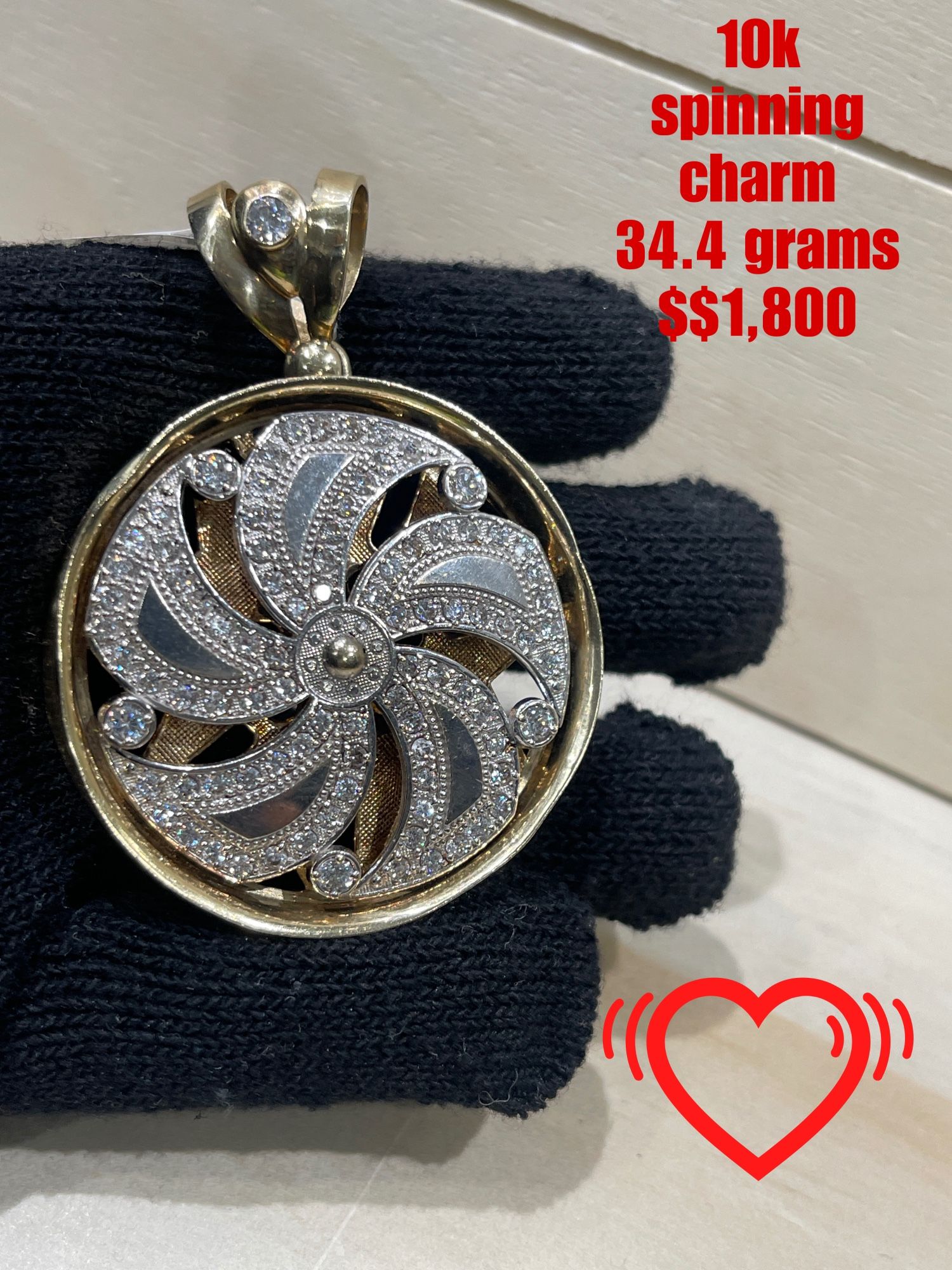 10k Spinning Charm With Stones 34.4 Grams