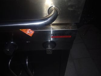 Char-Broil true performance dual grill with stove on the side no rust on the outside had it for a year used it twice