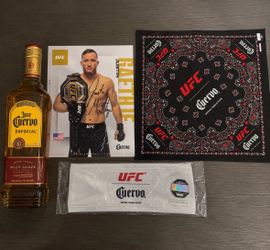 Justin Gaethje signed UFC memorabilia bundle, autographed bottle, signed card, bandana, and headband