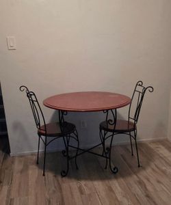 Wrought iron table and chairs
