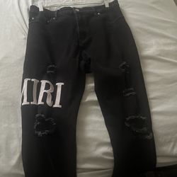 black amiri pants