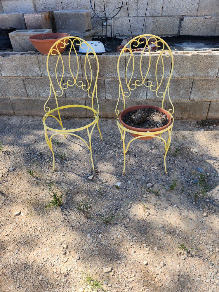 Two Antique  Metal Chairs