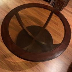 Large Round Mahogany Cocktail Table on wheels 