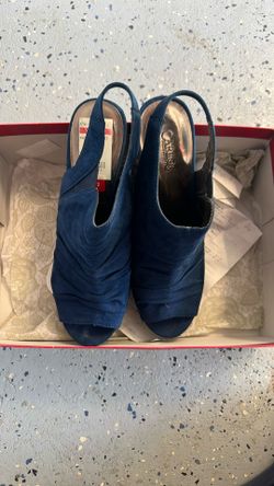 Carlos Santana Wedges