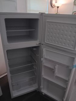 White Frigdaire 7.5 cubic ft mini refrigerator