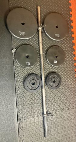 48 inches Steel Standard Barbell W/Weight Plates: 25s, 10s and 5s ponders. 93 # Brute W.