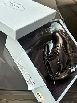 Prada Monolith leather and Re-Nylon booties with pouch