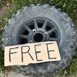 Polaris Rzr rim and tire