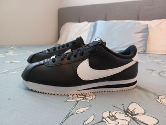 Black and white Nike Cortez 72
