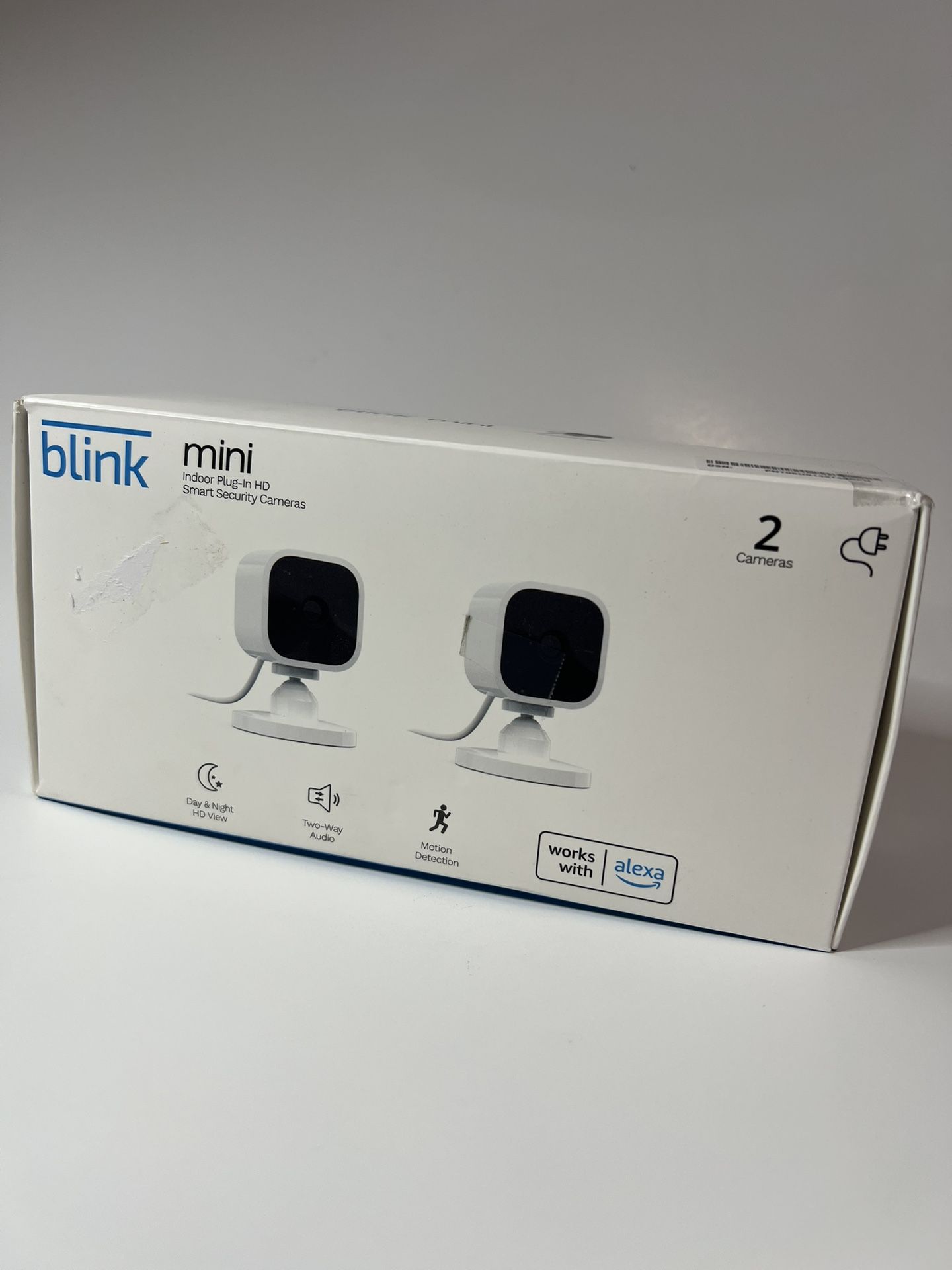 Blink Mini - Compact indoor plug-in smart security camera, 1080p HD video, night vision, motion detection, two-way audio, easy set up, Works with Alex